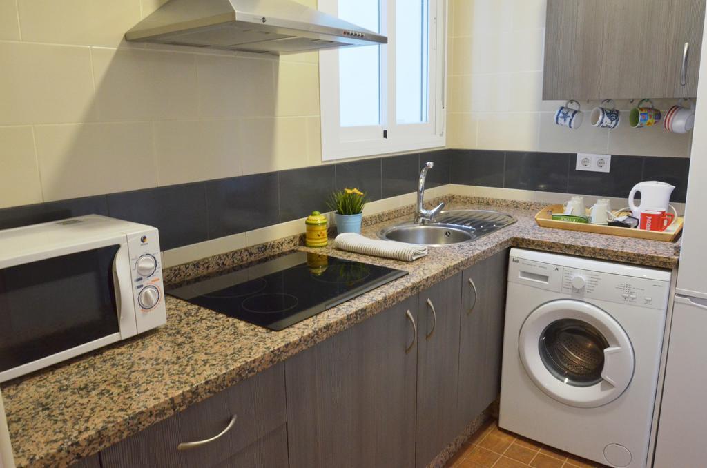 Apartamento San Jacinto Sevilla Bagian luar foto